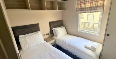 Internal of a caravan twin bedroom