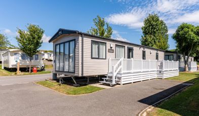 External of a caravan on pitch with decking