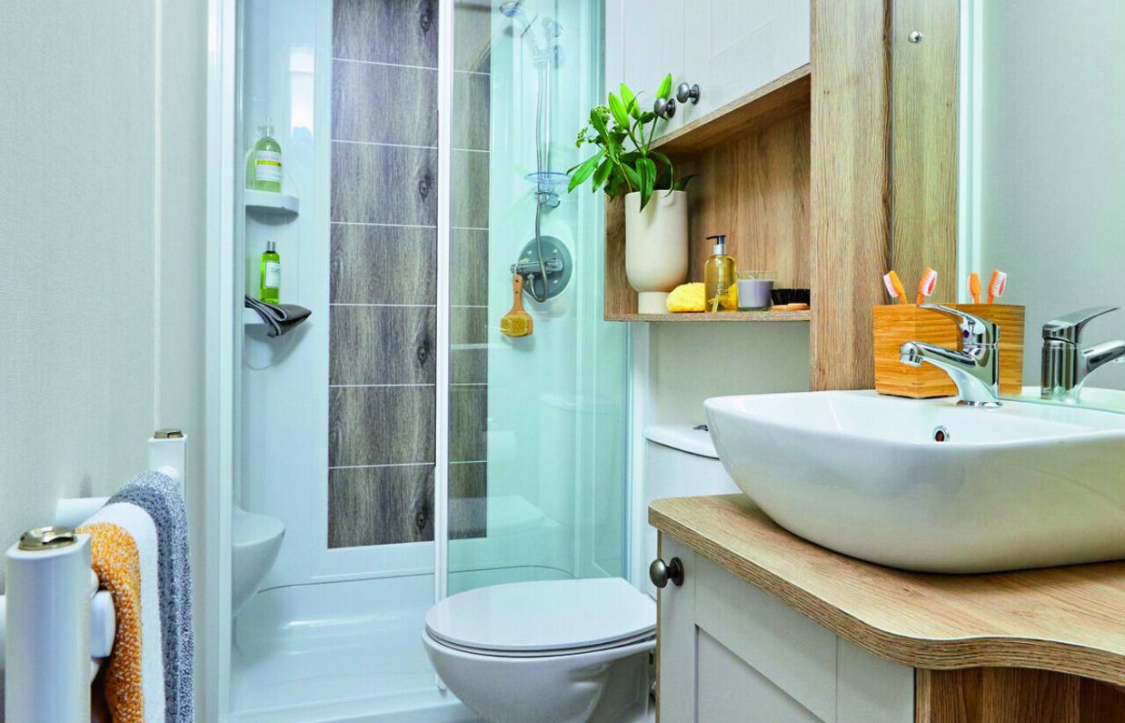 Internal of a caravan bathroom with shower toilet and sink