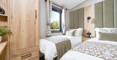 Internal of a caravan twin bedroom