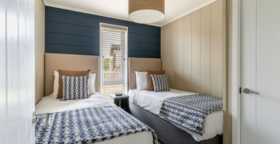 Internal of a luxury lodge twin bedroom