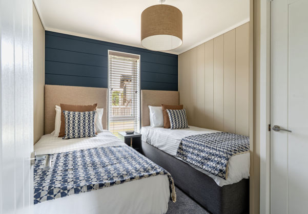 Internal of a luxury lodge twin bedroom