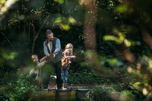 A Father and His Two Sons Fishing Among Nature at the Lake at Tregoad