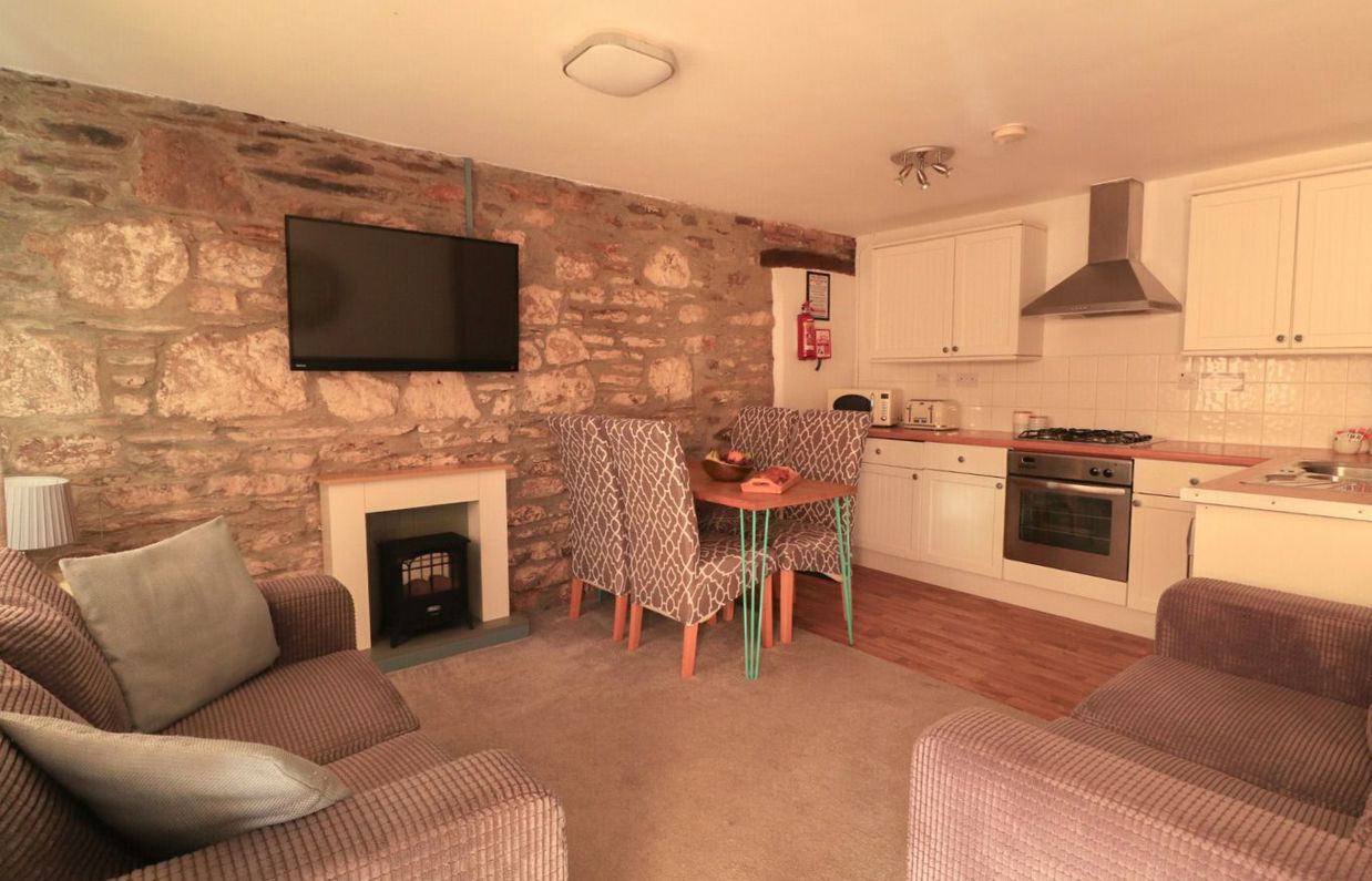 Internal of a cottage open plan kitchen lounge diner area