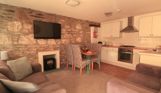 Internal of a cottage open plan kitchen lounge diner area