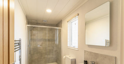 En Suite Shower room with large shower unit