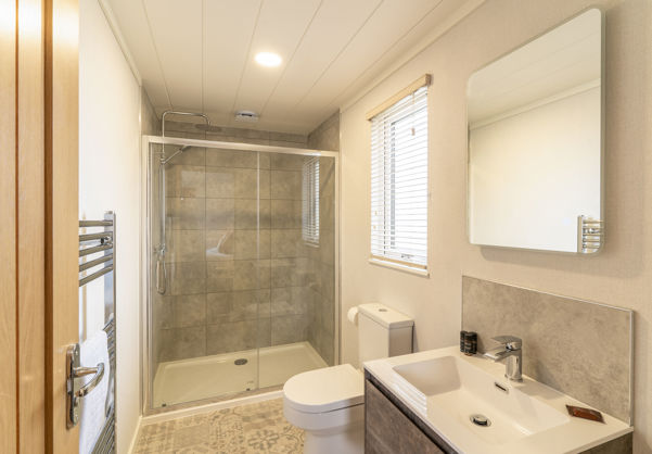 En Suite Shower room with large shower unit