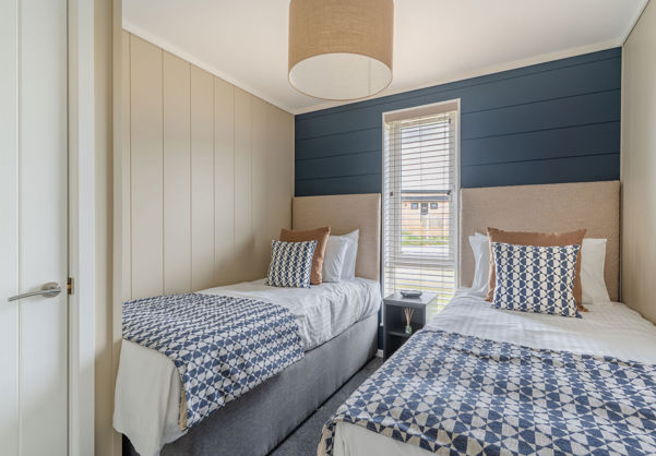 Internal of a luxury lodge twin bedroom