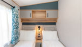 Internal of a caravan twin bedroom