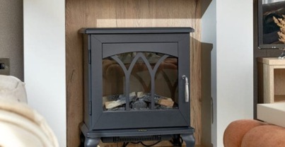 Internal of a caravan lounge with electric fire