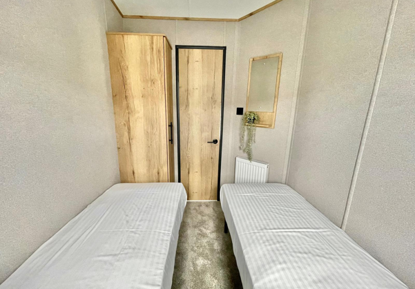 Internal of a caravan twin bedroom