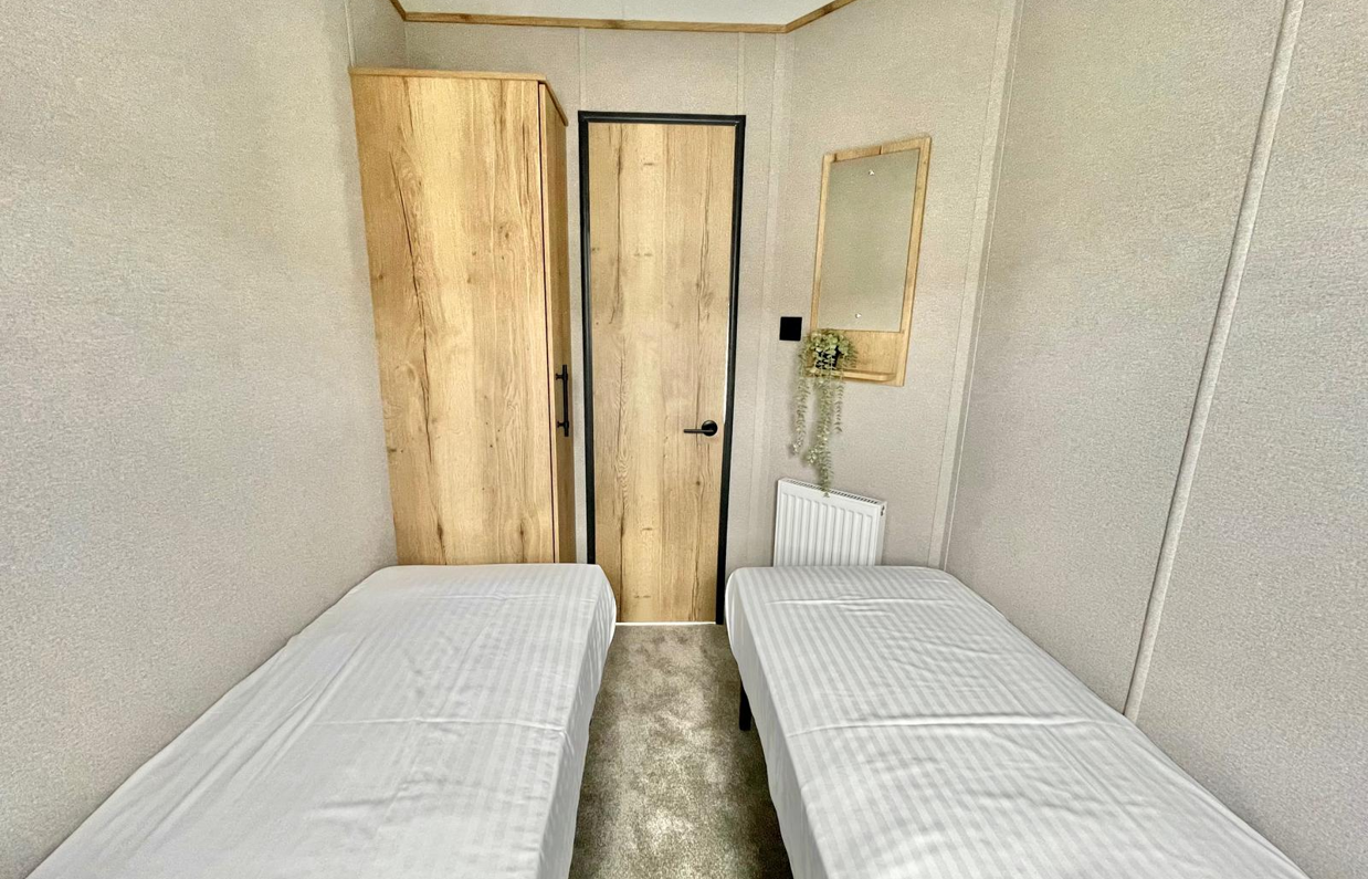 Internal of a caravan twin bedroom