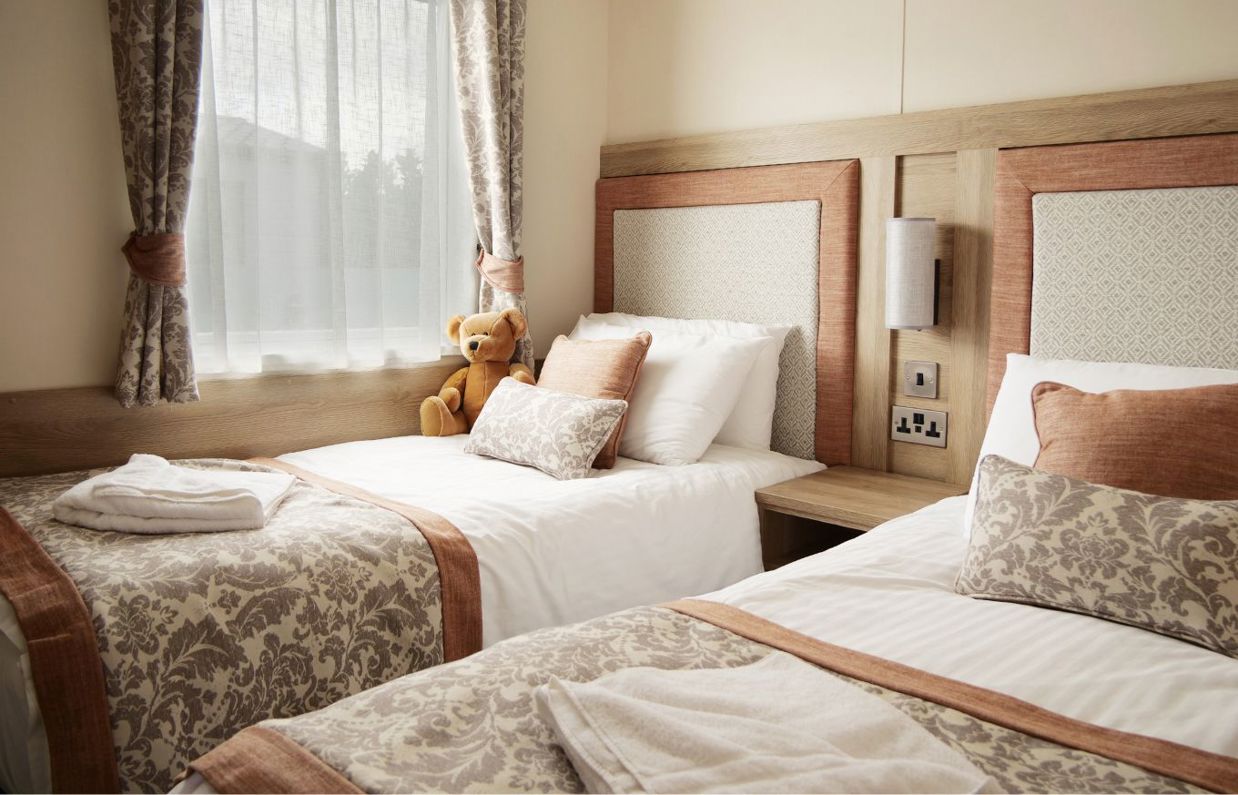 Internal of a caravan twin bedroom