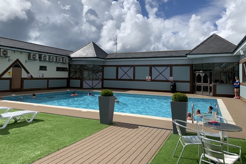 Outdoor pool from terrace at Bowleaze Cove Holiday Park