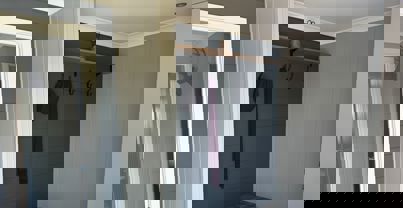 entrance of Prestige Forrester with seating, coat rack and shoe storage