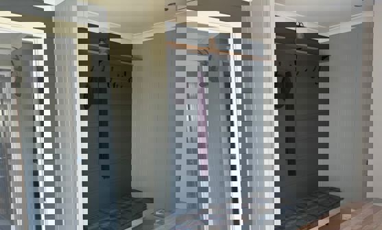 entrance of Prestige Forrester with seating, coat rack and shoe storage