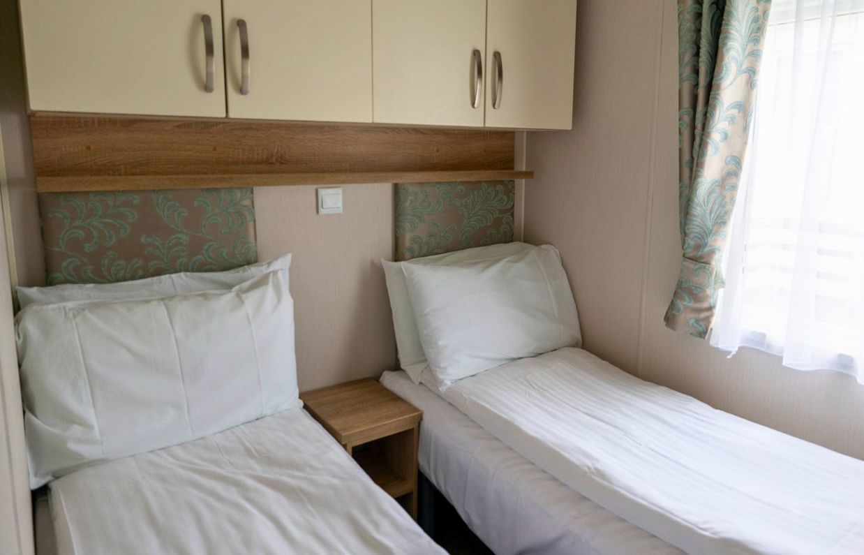 Internal of a caravan twin bedroom