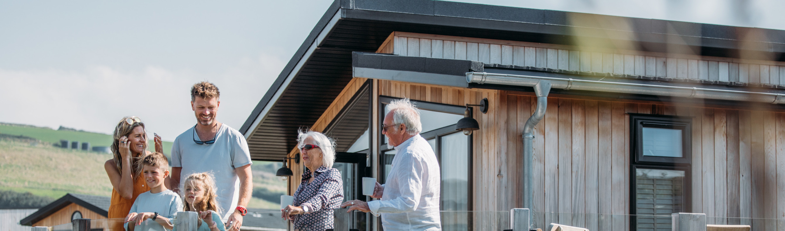 Multi-generational family gathering on deck