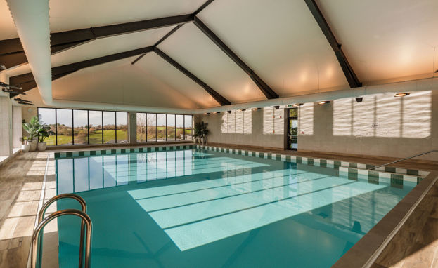 The Barn Swimming Pool with sunlight on water