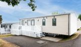 External of caravan on pitch with decking