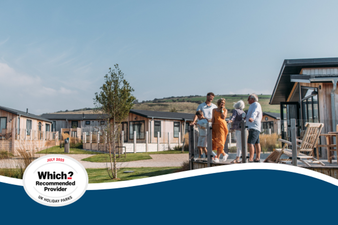An image of a family together on the decking of a lodge with the Which? Recommended 2025 logo in the corner