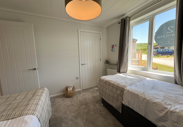 Internal of a luxury lodge twin bedroom