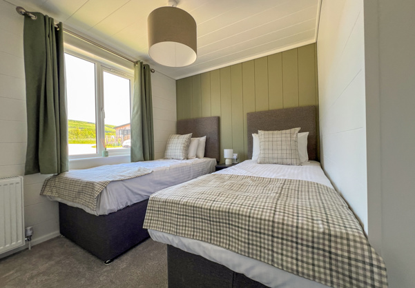 Internal of a luxury lodge twin bedroom