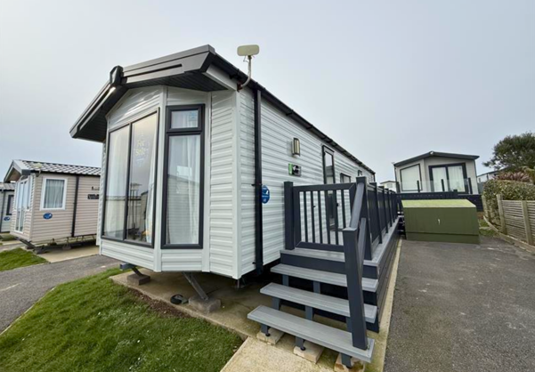 External of a caravan on pitch with decking